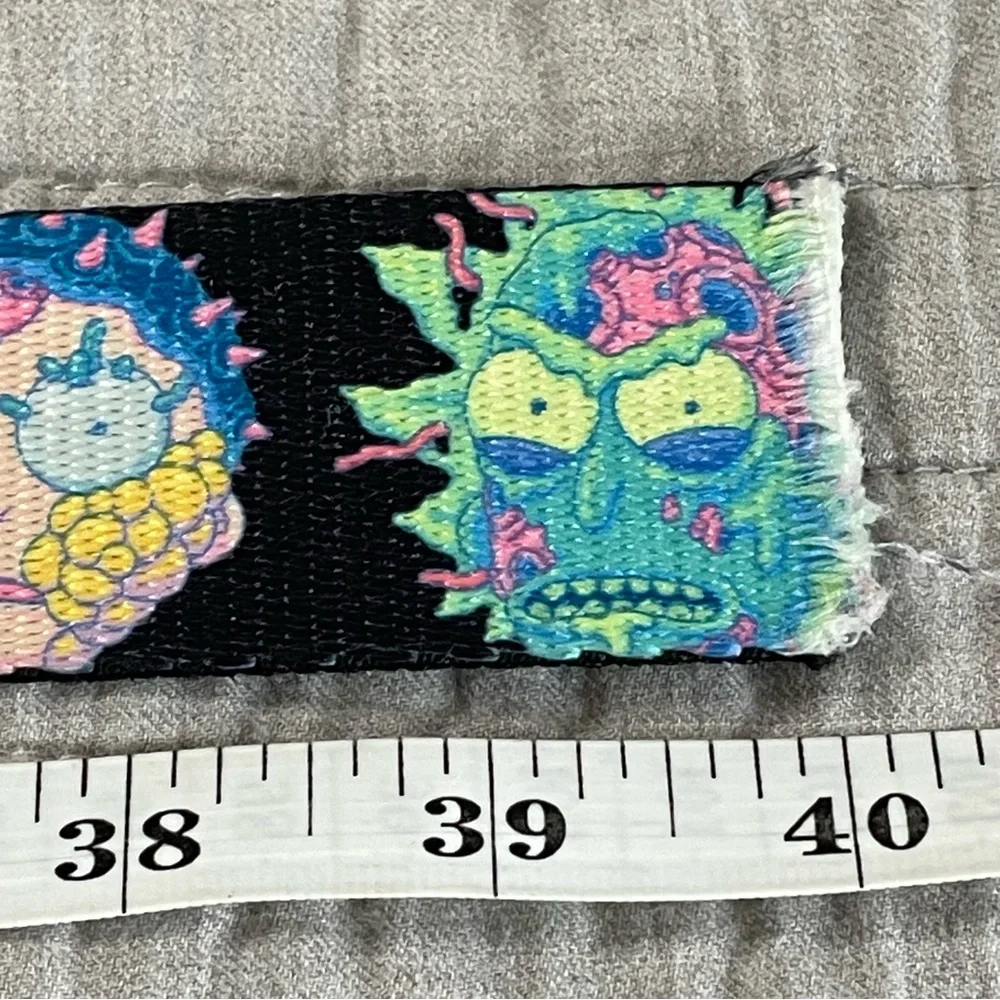 RICK AND MORTY Cell Faces Cinch Belt by Buckle Down Bottle Opener Black Web Men